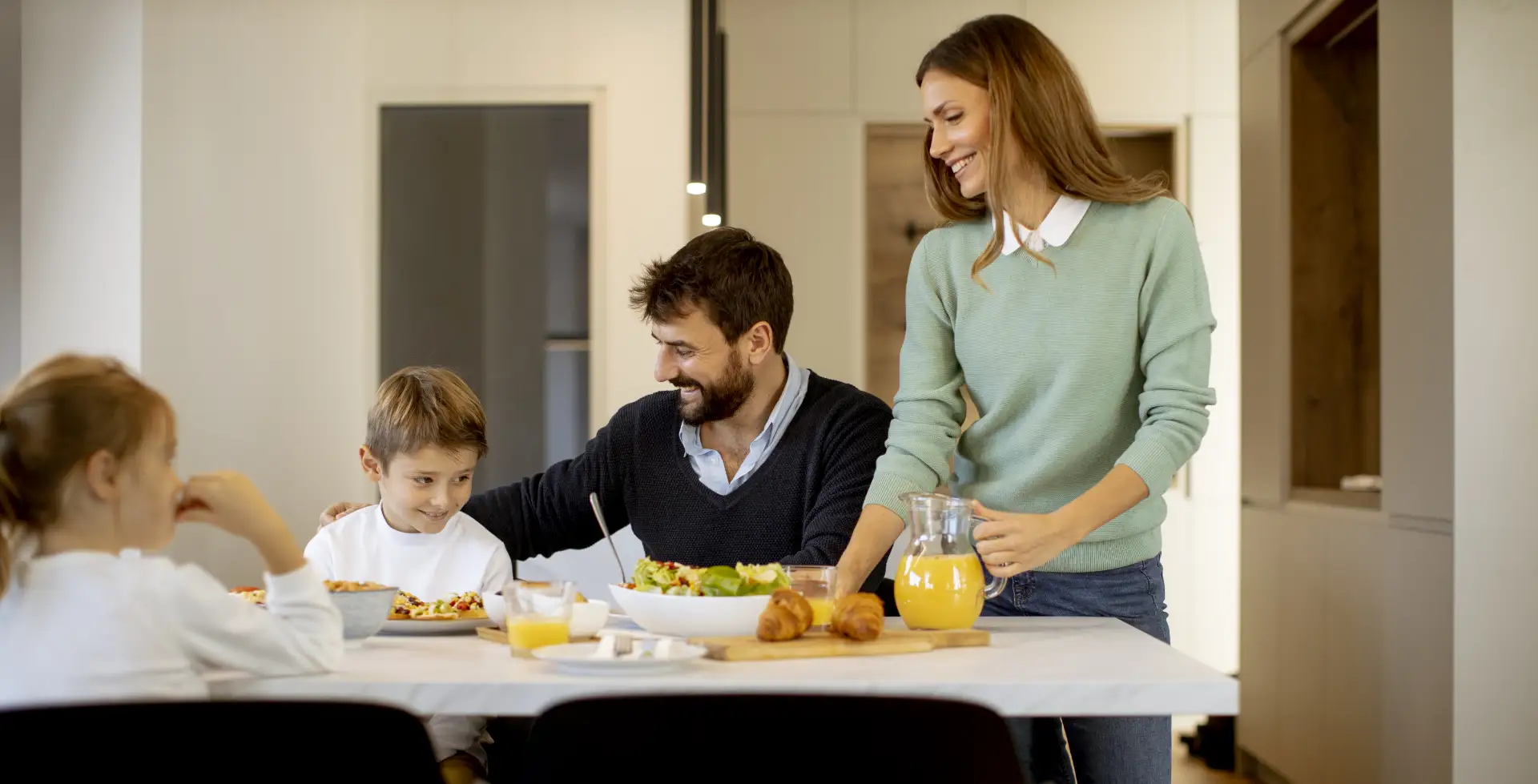 joyful-young-woman-drinking-coffee-looking-city-indoor-photo-pleased-curly-girl-brown-dress-spending-morning-balcony-2